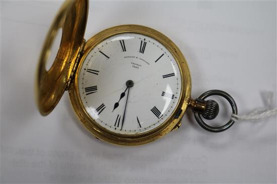 An 18ct gold half hunter fob watch.